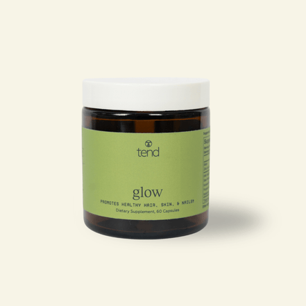 Tend Glow supplement bottle for healthy skin, hair, and nails with botanical and mineral blend